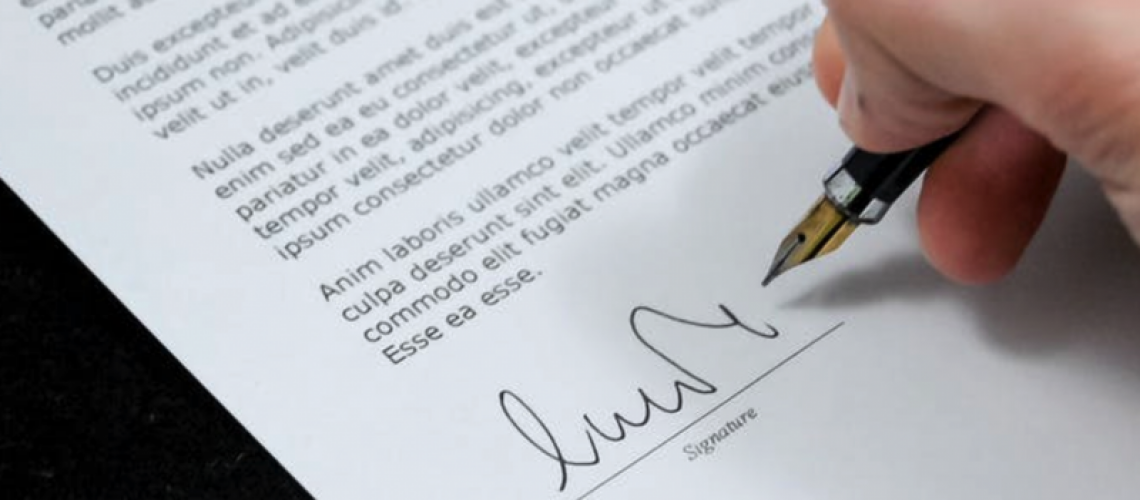 a recently-signed document of a successful business sale